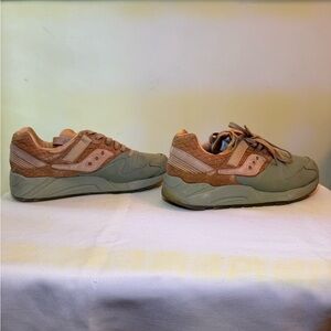 Tan and green Saucony shoes. Men’s size 7